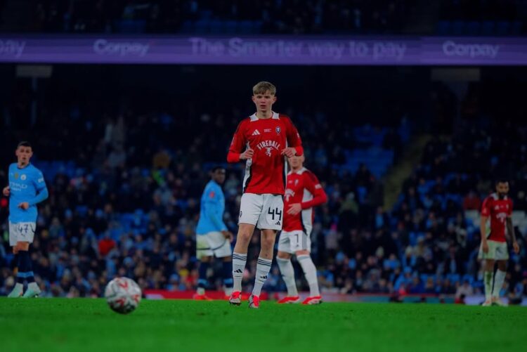 Will Wright making his Salford City debut against Manchester City (Photo via Wright on Instagram)