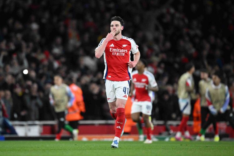 Declan Rice of Arsenal celebrates scoring his team's second goal during the UEFA Champions League 2024/25 Quarter Final First Leg match between Ars...