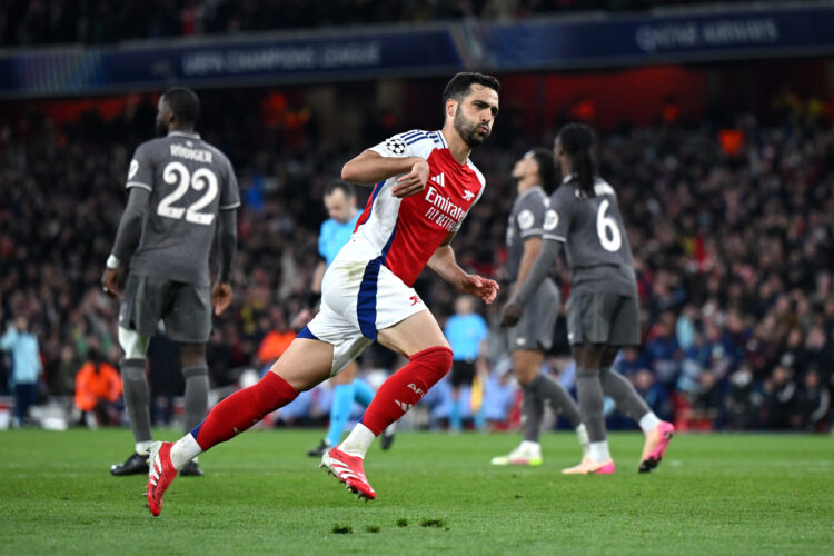 Mikel Merino of Arsenal celebrates scoring his team's third goal during the UEFA Champions League 2024/25 Quarter Final First Leg match between Ars...