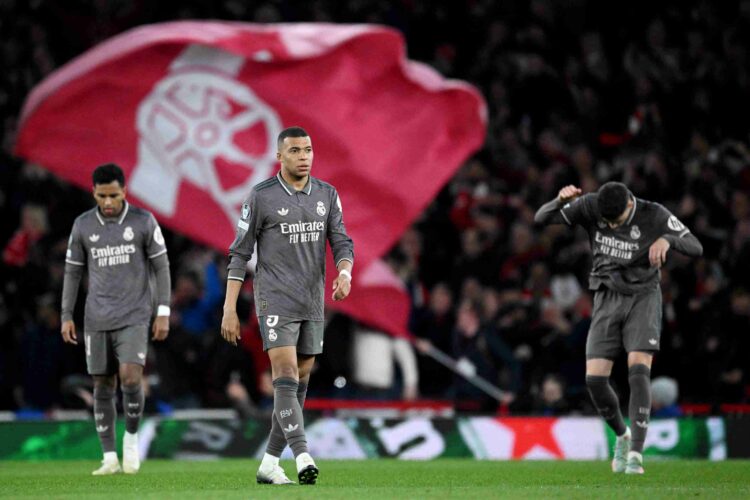 Kylian Mbappe of Real Madrid looks dejected after Mikel Merino of Arsenal (not pictured) scores his team's third goal during the UEFA Champions Lea...
