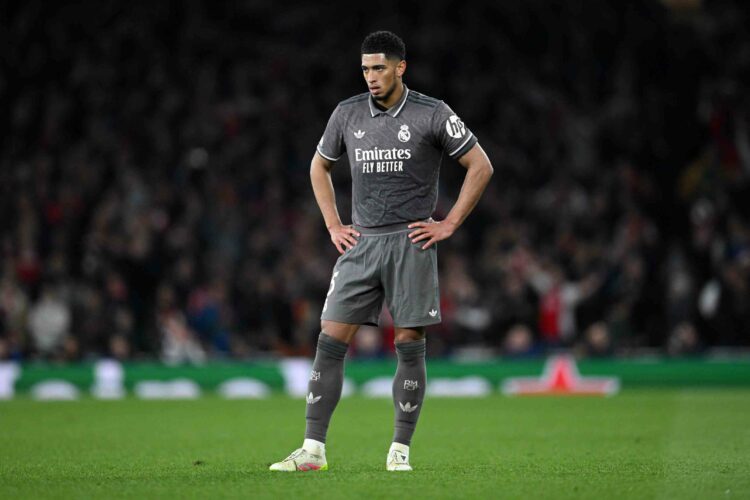 Jude Bellingham of Real Madrid looks dejected after Mikel Merino of Arsenal (not pictured) scores his team's third goal during the UEFA Champions L...