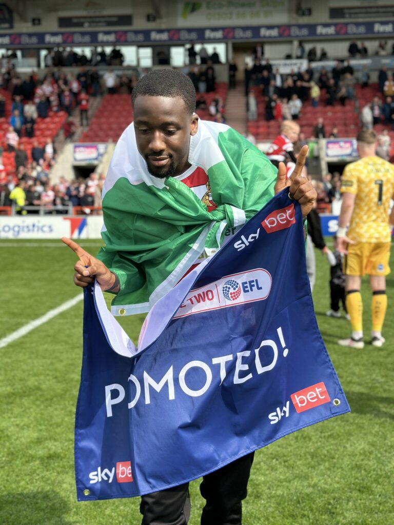 Another former Gunner achieves promotion 2 Joseph Olowu celebrates promotion to League One (Photo via Olowu on Twitter)