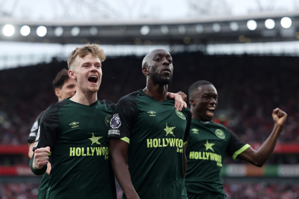 LONDON, ENGLAND - APRIL 12: Yoane Wissa of Brentford (R) celebrates scoring his team's first goal with teammate Keane Lewis-Potter during the Premier League match between Arsenal FC and Brentford FC at Emirates Stadium on April 12, 2025 in London, England. (Photo by Alex Davidson/Getty Images)