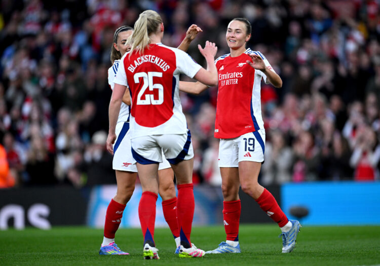 LONDON, ENGLAND - APRIL 15: Caitlin Foord of Arsenal celebrates scoring her team's first goal with teammates Katie McCabe and Stina Blackstenius du...