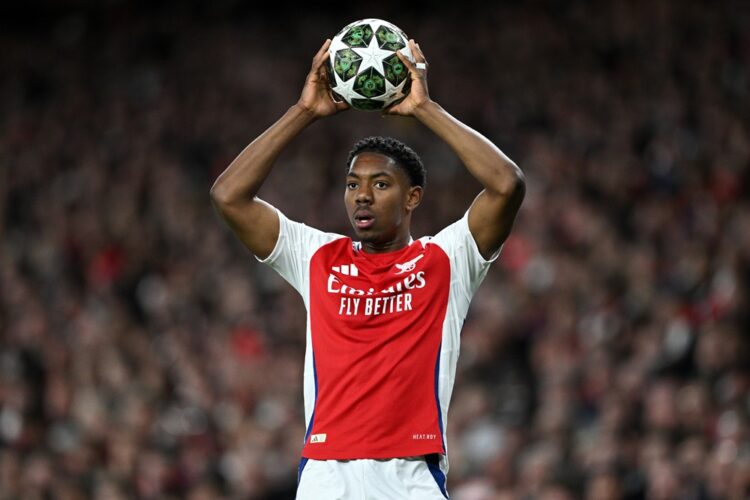LONDON, ENGLAND: Myles Lewis-Skelly of Arsenal takes a throw in during the UEFA Champions League 2024/25 Quarter Final First Leg match between Arse...