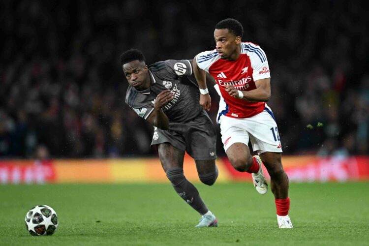 LONDON, ENGLAND - APRIL 08: Vinicius Junior of Real Madrid battles for possession with Jurrien Timber of Arsenal during the UEFA Champions League 2...