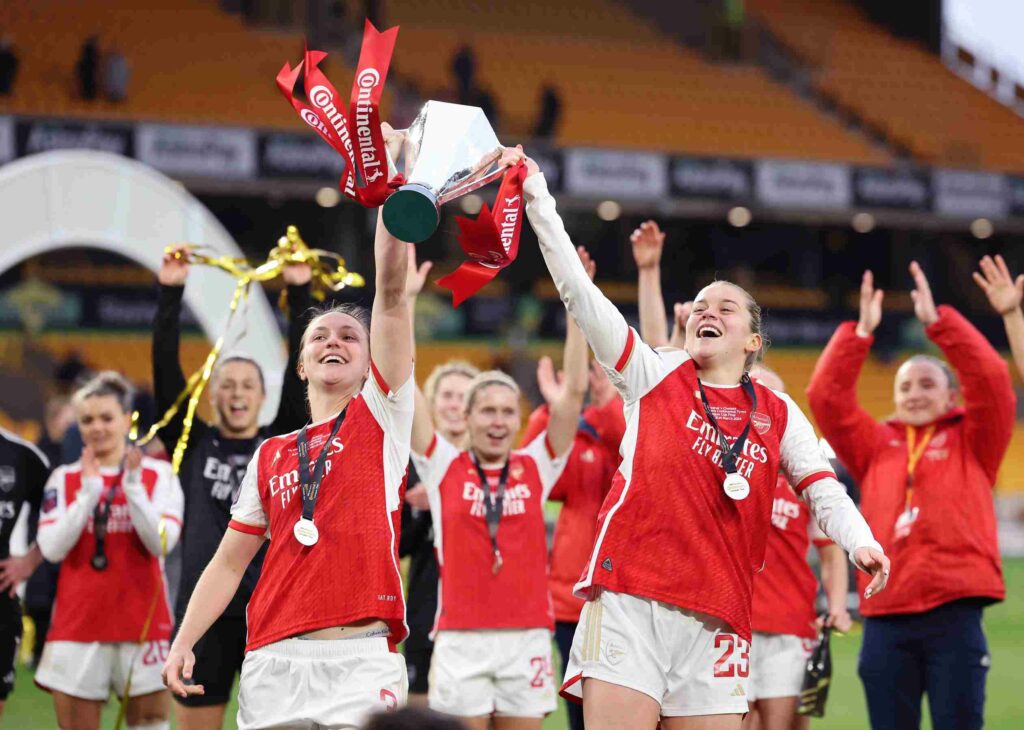 Arsenal 26yo signs new contract 2 WOLVERHAMPTON, ENGLAND - MARCH 31: Lotte Wubben-Moy and Alessia Russo of Arsenal celebrate with the Continental Tyres League Cup Trophy after their team's victory during the FA Women's Continental Tyres League Cup Final match between Arsenal and Chelsea at Molineux on March 31, 2024 in Wolverhampton, England. (Photo by Matt McNulty/Getty Images) (Photo by Matt McNulty/Getty Images)