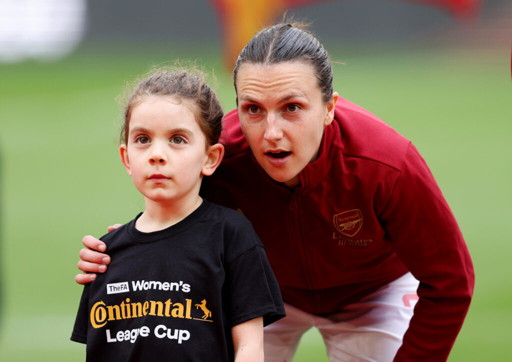 Arsenal 26yo signs new contract 3 WOLVERHAMPTON, ENGLAND - MARCH 31: Lotte Wubben-Moy of Arsenal interacts with a mascot whilst lining up prior to the FA Women's Continental Tyres League Cup Final match between Arsenal and Chelsea at Molineux on March 31, 2024 in Wolverhampton, England. (Photo by Matt McNulty/Getty Images)