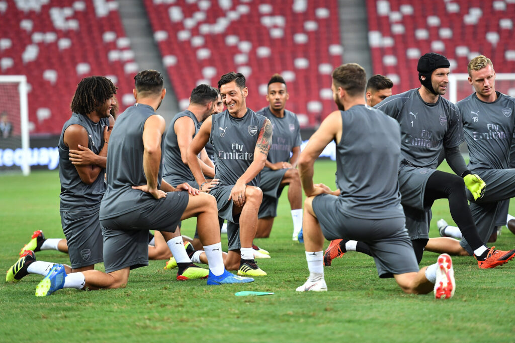 Arsenal to hold open training session in Singapore, ticket details announced 3 SINGAPORE - JULY 27: Mesut Ozil #10 of Arsenal smiles on training ahead of the International Champions Cup 2018 match between Arsenal v Paris Saint Germain on July 27, 2018 in Singapore. (Photo by Thananuwat Srirasant/Getty Images for ICC)