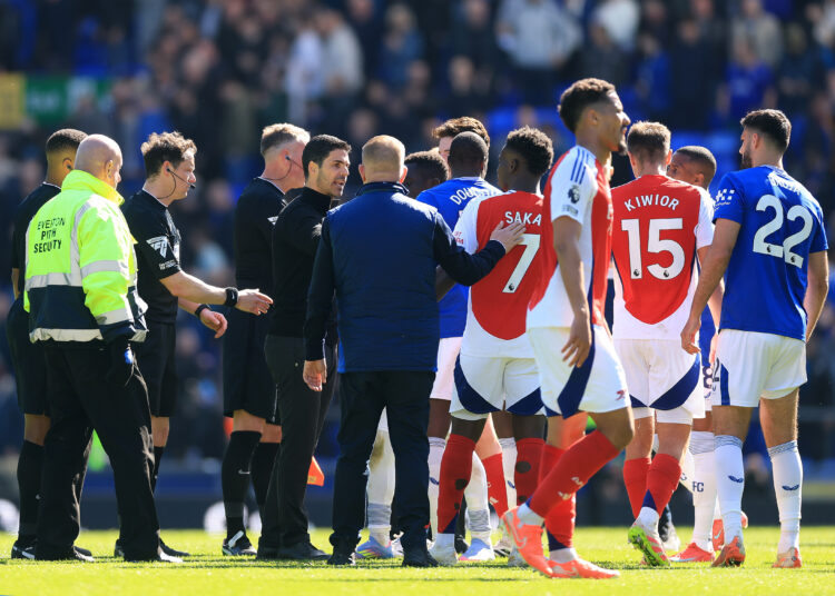 LIVERPOOL, ENGLAND - APRIL 05: Mikel Arteta, Manager of Arsenal, talks to Bukayo Saka at full time during the Premier League match between Everton ...