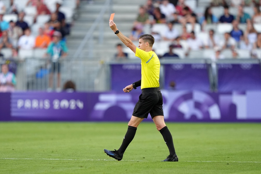 Euro 2024 final referee appointed for Real Madrid-Arsenal clash 4 BORDEAUX, FRANCE: Referee Francois Letexier, shows a red card to Wilder Viera #10 of Team Paraguay during the Men's group D match between Japan and Paraguay during the Olympic Games Paris 2024 at Nouveau Stade de Bordeaux on July 24, 2024. (Photo by Juan Manuel Serrano Arce/Getty Images)