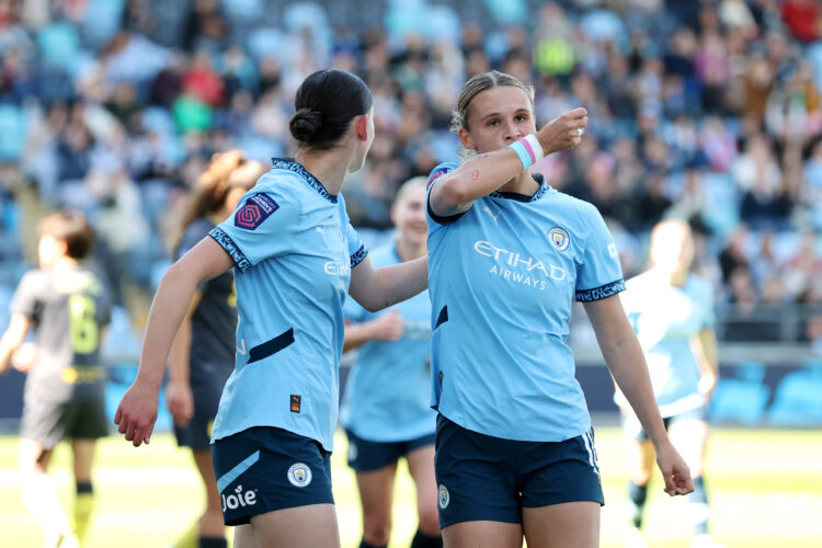MANCHESTER, ENGLAND - APRIL 20: Kerstin Casparij of Manchester City kisses her wrist as she celebrates scoring her team's first goal during the Bar...