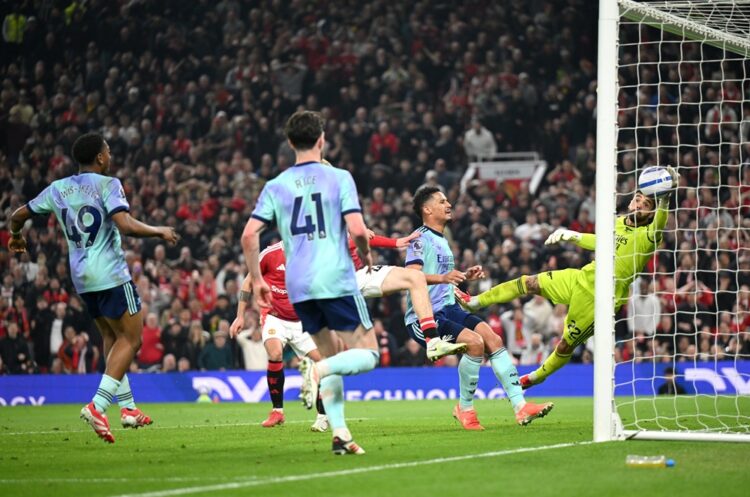 MANCHESTER, ENGLAND: David Raya of Arsenal makes a save on the line during the Premier League match between Manchester United FC and Arsenal FC at ...