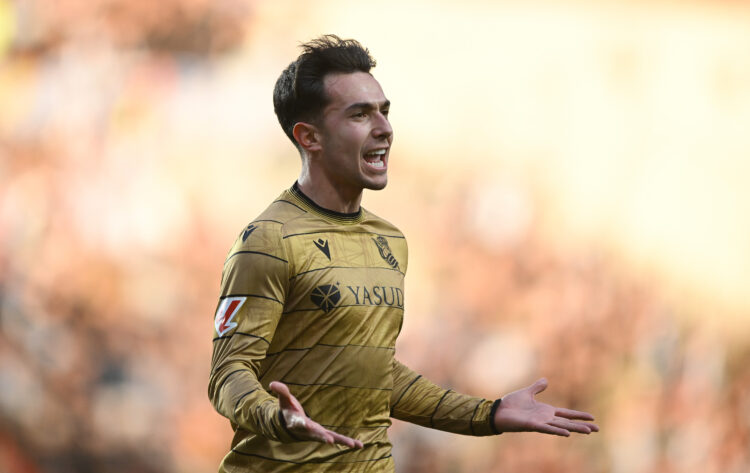 MADRID, SPAIN - MARCH 16: Martin Zubimendi of Real Sociedad celebrates after scoring his team's opening goal during the LaLiga match between Rayo V...