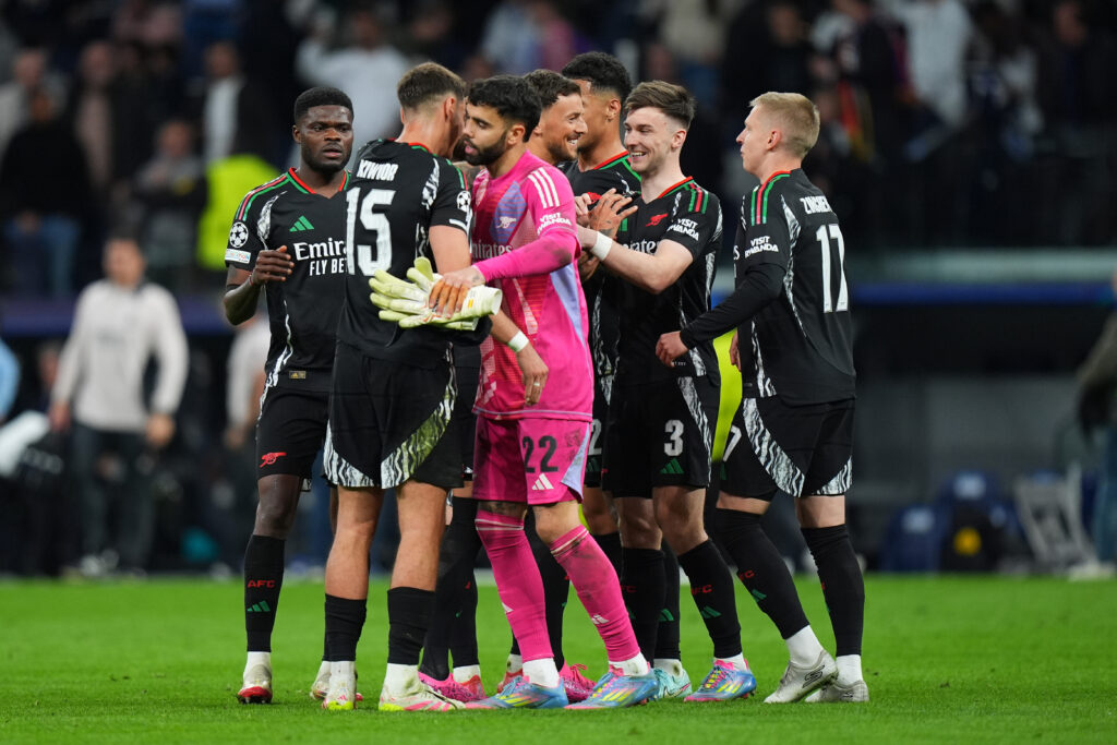 MADRID, SPAIN - APRIL 16: Players of Arsenal celebrate victory following the UEFA Champions League 2024/25 Quarter Final Second Leg match between Real Madrid C.F. and Arsenal FC at Estadio Santiago Bernabeu on April 16, 2025 in Madrid, Spain. (Photo by Angel Martinez/Getty Images)