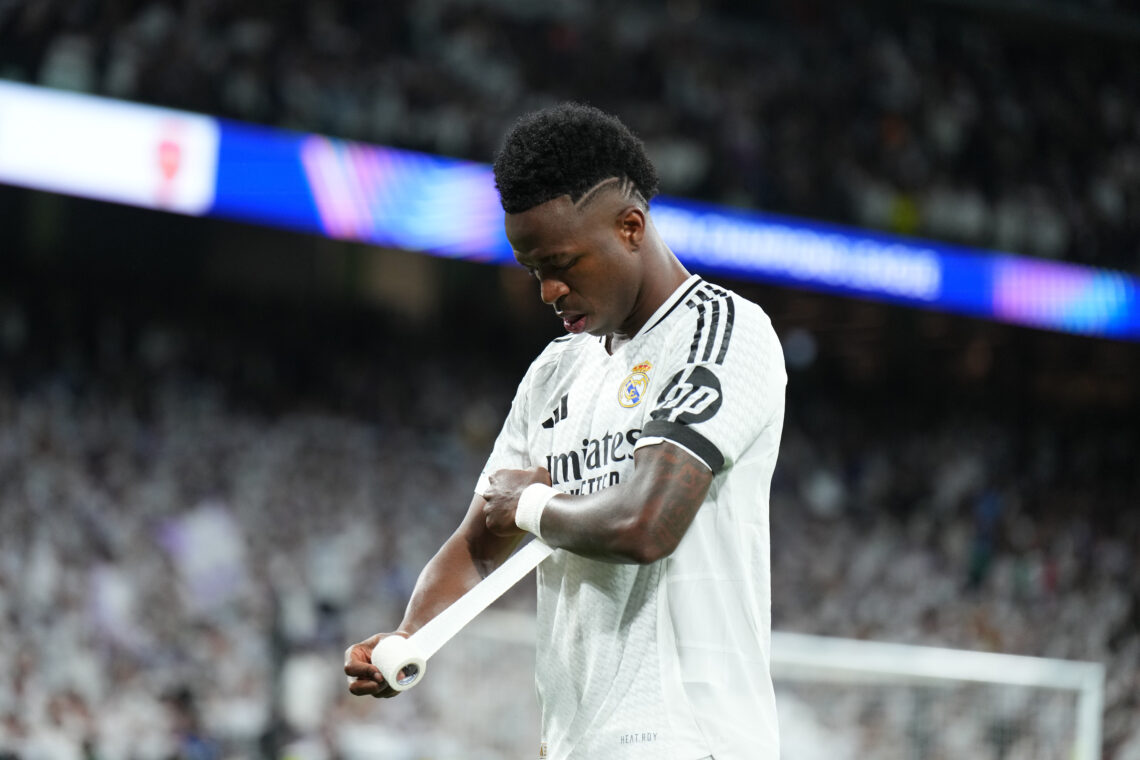 MADRID, SPAIN - APRIL 16: Vinicius Junior of Real Madrid applies tape to his wrist prior to the UEFA Champions League 2024/25 Quarter Final Second ...