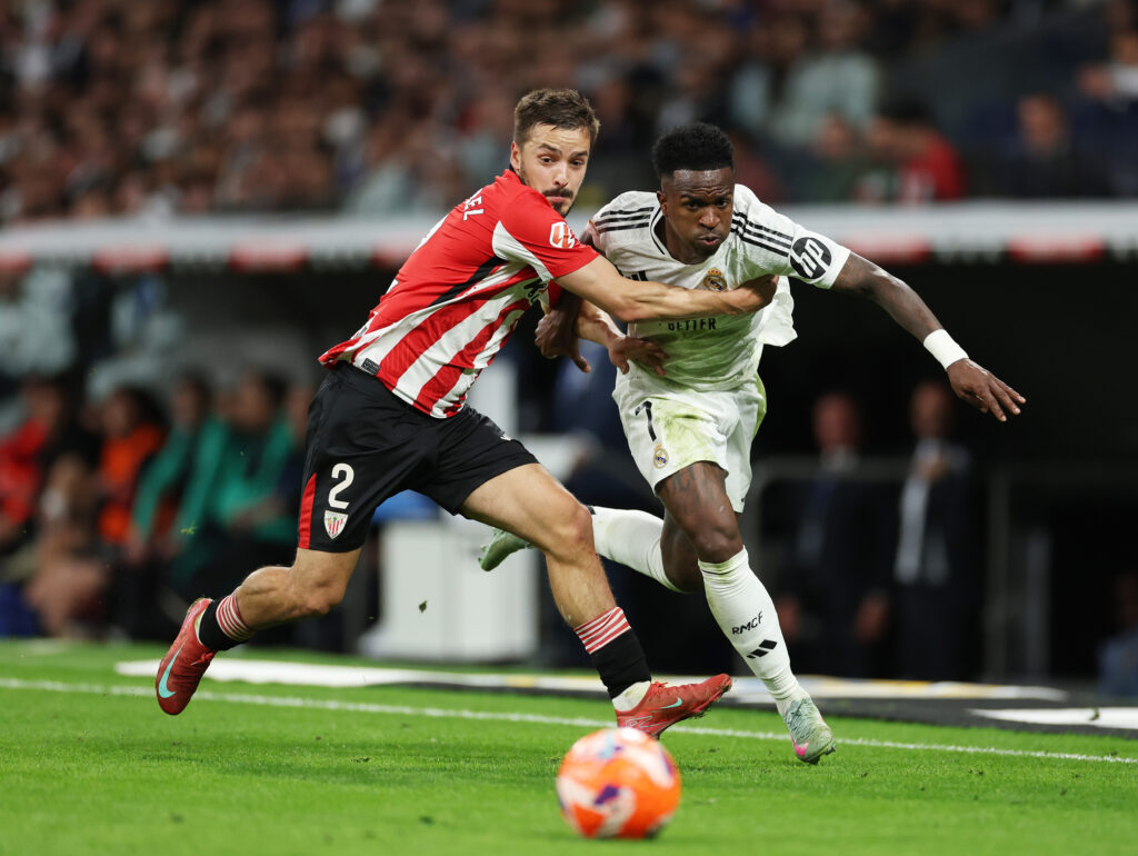 Arsenal’s Champions League win leaves lasting impact on Real Madrid 3 MADRID, SPAIN - APRIL 20: Andoni Gorosabel of Athletic Club and Vinicius Junior of Real Madrid compete for the ball during the LaLiga match between Real Madrid CF and Athletic Club at Estadio Santiago Bernabeu on April 20, 2025 in Madrid, Spain. (Photo by Florencia Tan Jun/Getty Images)