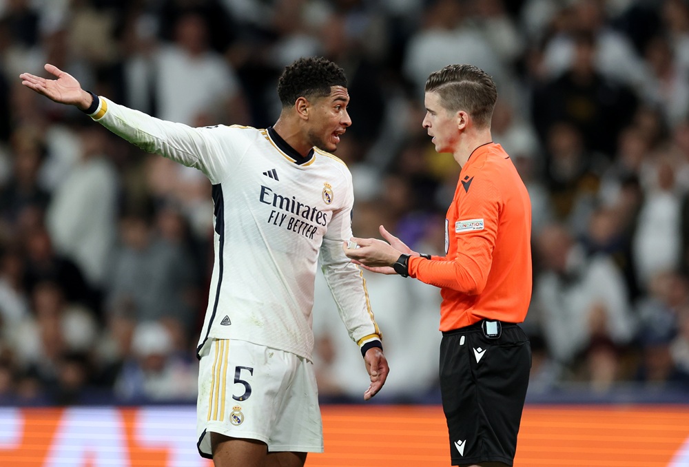 Euro 2024 final referee appointed for Real Madrid-Arsenal clash 3 MADRID, SPAIN: Jude Bellingham of Real Madrid speaks with Match Referee Francois Letexier during the UEFA Champions League quarter-final first leg match between Real Madrid CF and Manchester City at Estadio Santiago Bernabeu on April 09, 2024. (Photo by Clive Brunskill/Getty Images)
