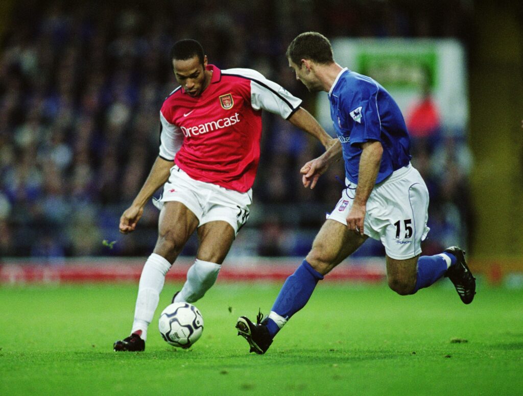 Ipswich Town v Arsenal preview: Injury news & match stats 3 1 Dec 2001: Thierry Henry of Arsenal looks to go past Chris Makin of Ipswich Town during the FA Barclaycard Premiership match played at Portman Road, in Ipswich, England. Arsenal won the match 2-0. Mandatory Credit: Clive Mason /Allsport