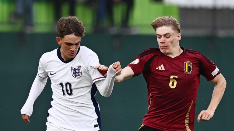 RROGOZHINE, ALBANIA: Max Dowman of England is challenged by Nathan De Cat of Belgium during the UEFA European Under-17 Championship 2024/25 Group B...