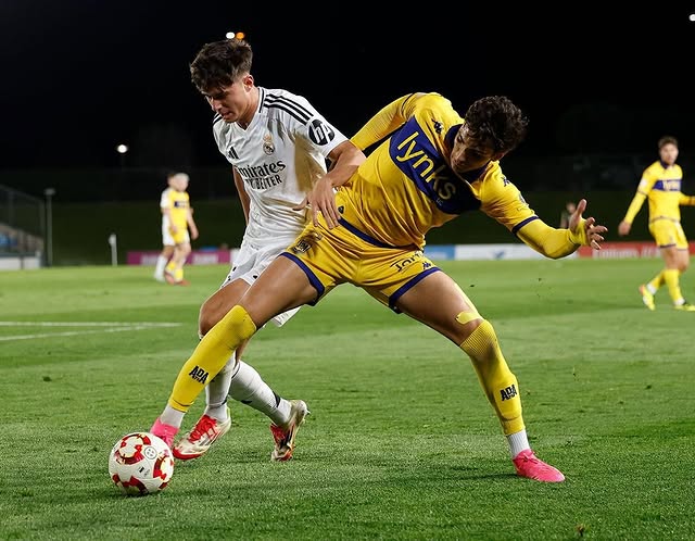 Victor Valdepenas competes for the ball whilst playing for Real Madrid Castilla (Photo via Valdepenas on Instagram)