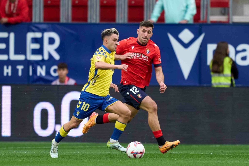 Arsenal rekindle interest in €60m playmaker they first spotted at 19 3 Jesus Areso of CA Osasuna duels for the ball with Alberto Moleiro of UD Las Palmas during the LaLiga match between CA Osasuna and UD Las Palmas at ...