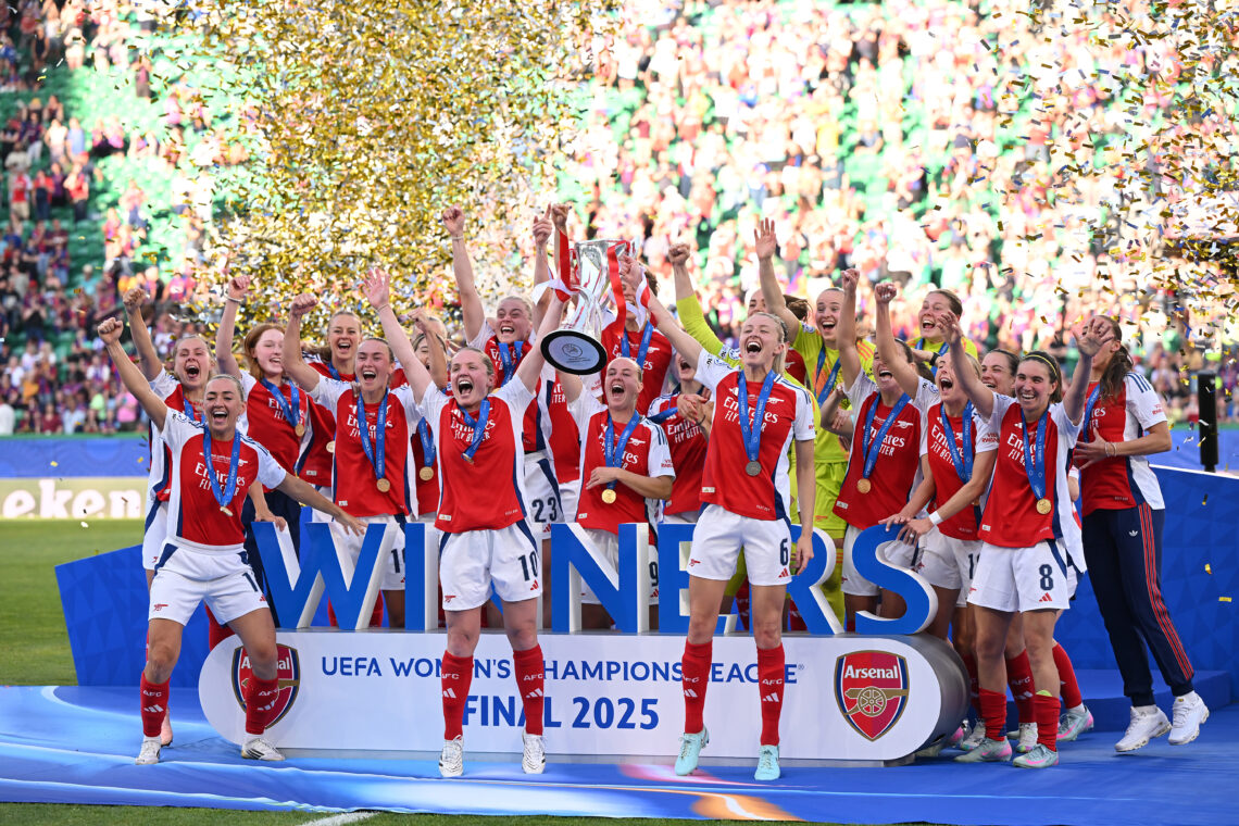 LISBON, PORTUGAL - MAY 24: Kim Little and Leah Williamson of Arsenal lift the UEFA Women's Champions League trophy after their team's victory in th...