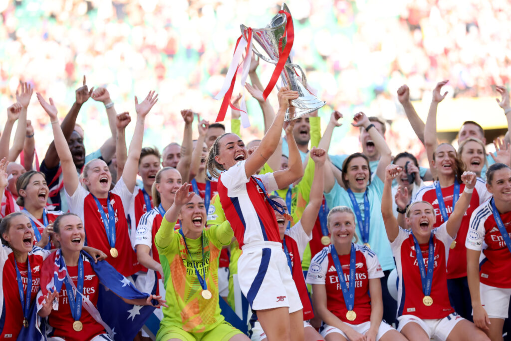 Can an Arsenal nominee win the Ballon d'Or? Part 1 6 LISBON, PORTUGAL - MAY 24: Katie McCabe of Arsenal lifts the UEFA Women's Champions League trophy after her team's victory in the UEFA Women's Champions League final match between Arsenal WFC and FC Barcelona at Estadio Jose Alvalade on May 24, 2025 in Lisbon, Portugal. (Photo by Maja Hitij/Getty Images)