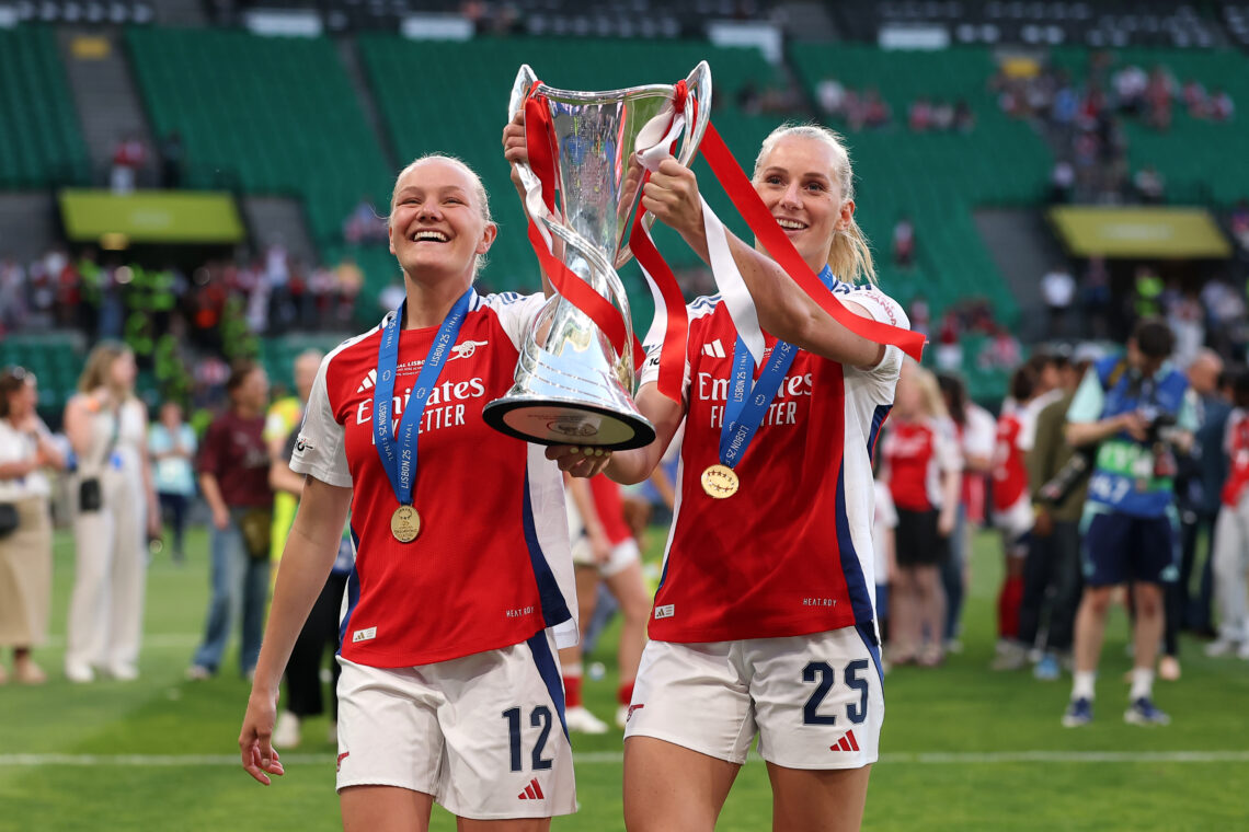 LISBON, PORTUGAL - MAY 24: Frida Maanum and Stina Blackstenius of Arsenal lift the UEFA Women's Champions League trophy after their team's victory ...