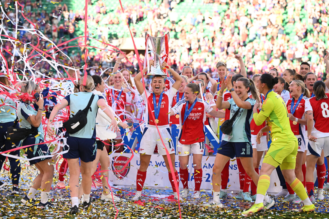 LISBON, PORTUGAL - MAY 24: Katie McCabe of Arsenal lifts the UEFA Women's Champions League trophy after her team's victory in the UEFA Women's Cham...