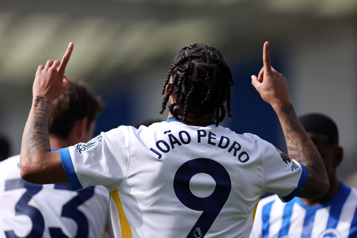 BRIGHTON, ENGLAND - APRIL 12: Joao Pedro of Brighton & Hove Albion celebrates scoring his team's first goal from the penalty spot during the Pr...