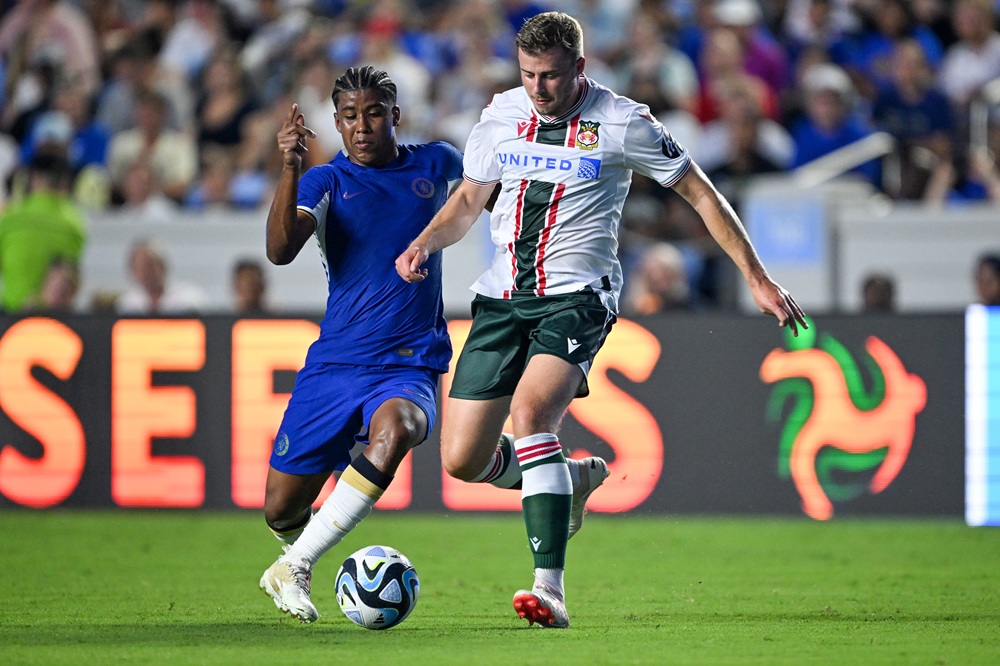 CHAPEL HILL, NORTH CAROLINA: Andrey Santos of Chelsea FC challenges James Jones of Wrexham AFC during the first half of a pre-season friendly match at Kenan Stadium on July 19, 2023. (Photo by Grant Halverson/Getty Images)