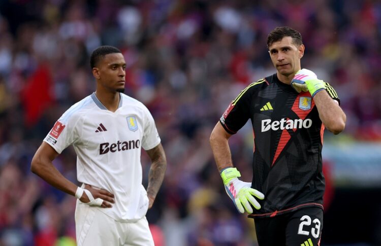 LONDON, ENGLAND: Ezri Konsa and Emiliano Martinez of Aston Villa looks dejected after the Emirates FA Cup Semi Final match between Crystal Palace a...