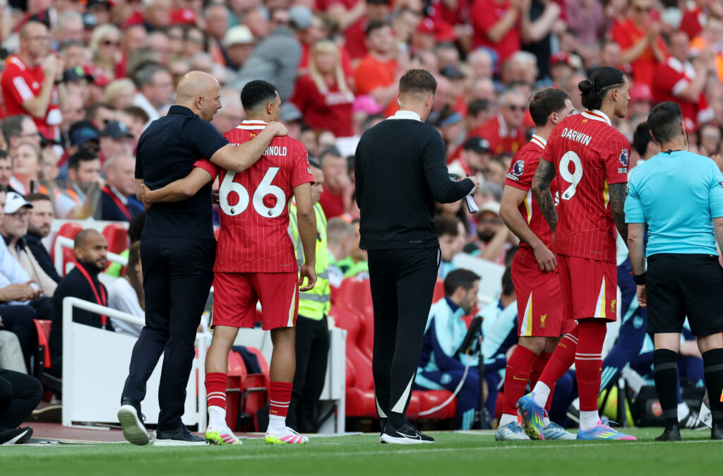 Arsenal comeback at Liverpool overshadowed by red card and injuries 5 LIVERPOOL, ENGLAND - MAY 11: Trent Alexander-Arnold of Liverpool is embraced by Arne Slot, Manger of Liverpool, as he prepares to come on as a substitute during the Premier League match between Liverpool FC and Arsenal FC at Anfield on May 11, 2025 in Liverpool, England. (Photo by Carl Recine/Getty Images)