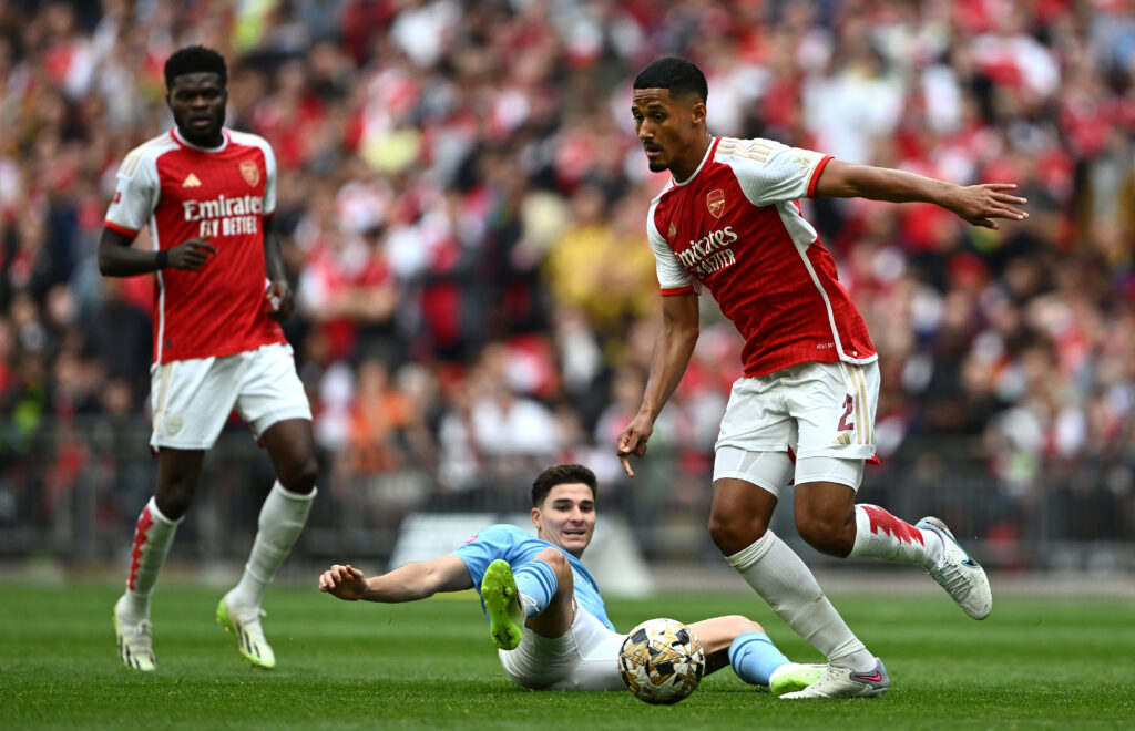 Arsenal 'bidding strongest' for 29-goal former Manchester City forward 4 LONDON, ENGLAND - AUGUST 06: William Saliba of Arsenal is tackled by Julian Alvarez of Manchester City during The FA Community Shield match between Manchester City against Arsenal at Wembley Stadium on August 06, 2023 in London, England. (Photo by Mike Hewitt/Getty Images)