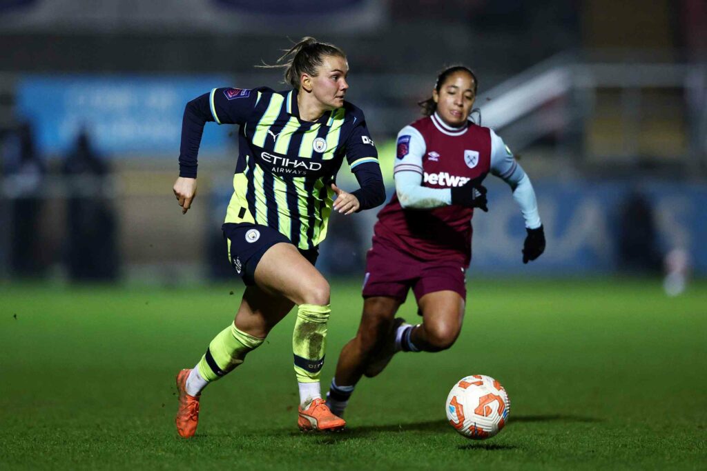 Arsenal loan review: Who will return next season? 2 DAGENHAM, ENGLAND - MARCH 05: Laura Wienroither of Manchester City runs with the ball whilst under pressure from Manuela Pavi of West Ham United during the Barclays Women's Super League match between West Ham United and Manchester City at Chigwell Construction Stadium on March 05, 2025 in Dagenham, England. (Photo by James Fearn/Getty Images)