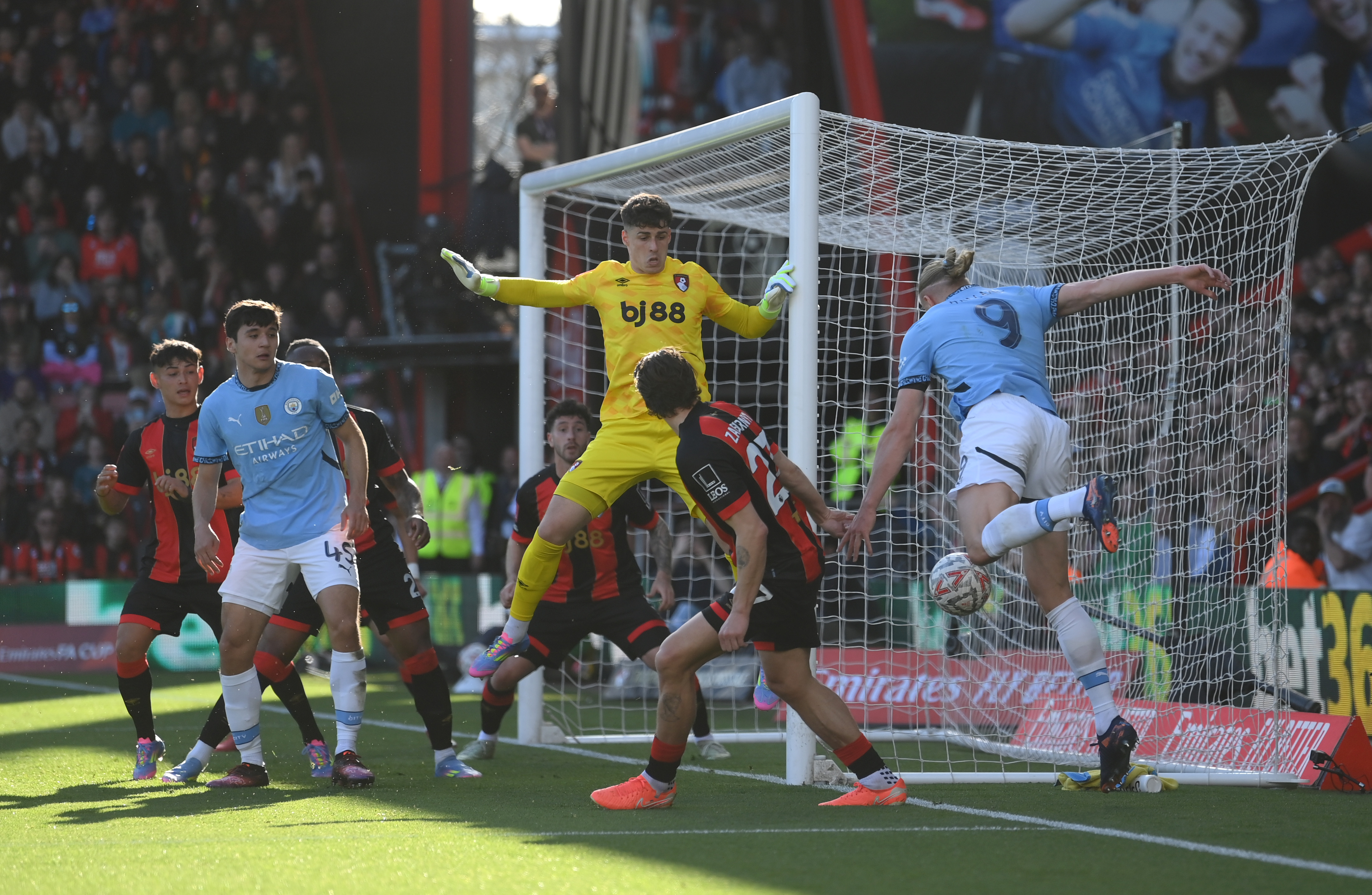 BOURNEMOUTH, ENGLAND - MARCH 30: Erling Haaland of Manchester City heads the ball inside the AFC Bournemouth penalty area whilst under pressure from Kepa Arrizabalaga and Illya Zabarnyi of AFC Bournemouth during the Emirates FA Cup Quarter Final match between AFC Bournemouth and Manchester City at Vitality Stadium on March 30, 2025 in Bournemouth, England. (Photo by Mike Hewitt/Getty Images)