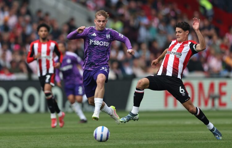 BRENTFORD, ENGLAND: Emile Smith Rowe of Fulham battles for possession with Christian Norgaard of Brentford during the Premier League match between ...