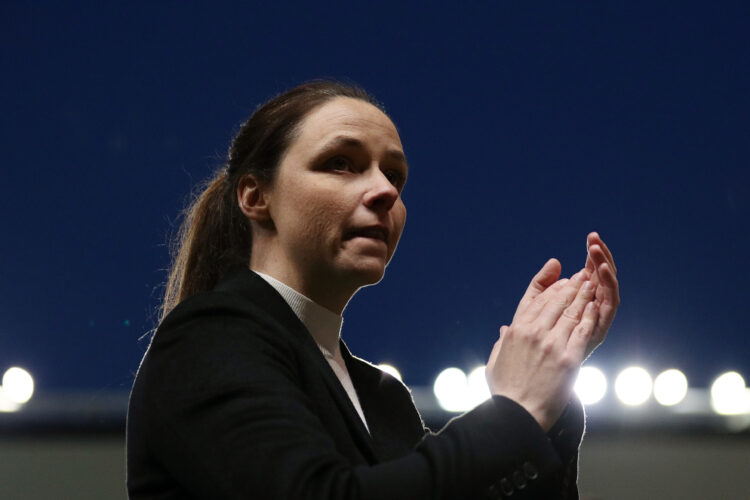 BRISTOL, ENGLAND: Lauren Smith, Manager of Bristol City, applauds the fans following confirmation of the team's relegation from the Barclays Women'...