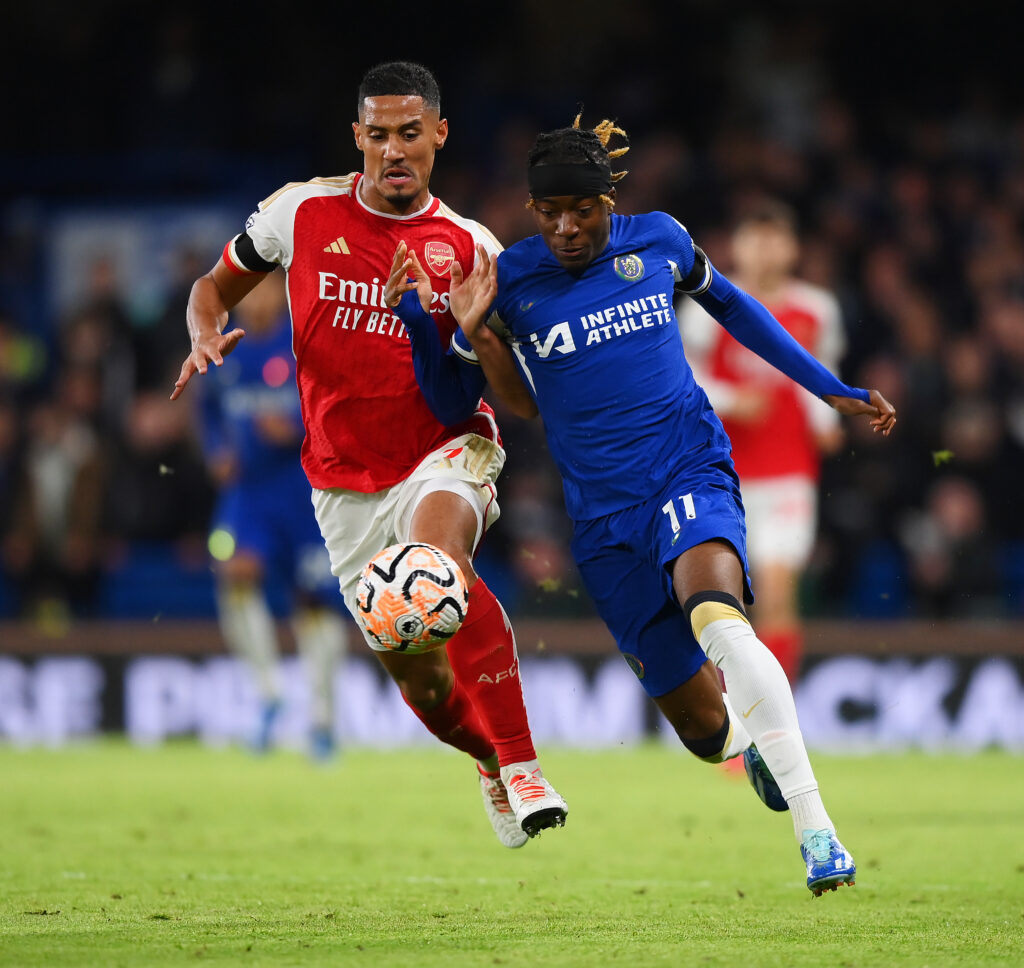 Chelsea manager responds to Arsenal interest in Madueke 3 LONDON, ENGLAND - OCTOBER 21: William Saliba of Arsenal and Noni Madueke of Chelsea battle for the ball during the Premier League match between Chelsea FC and Arsenal FC at Stamford Bridge on October 21, 2023 in London, England. (Photo by Justin Setterfield/Getty Images)