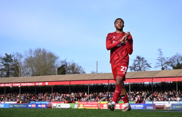 CRAWLEY, ENGLAND: Bradley Ibrahim of Crawley Town applauds the fans as he walks off during the Sky Bet League One match between Crawley Town FC and...