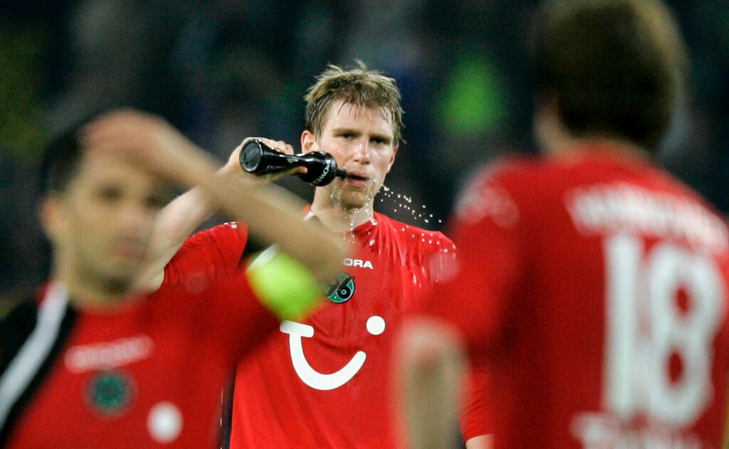 HANOVER, GERMANY - MAY 02: Per Mertesacker of Hanover looks drinks after the Bundesliga match between Hanover 96 and Borussia Dortmund at the AWD Arena on May 2, 2006 in Hanover, Germany. (Photo by Friedemann Vogel/Bongarts/Getty Images)