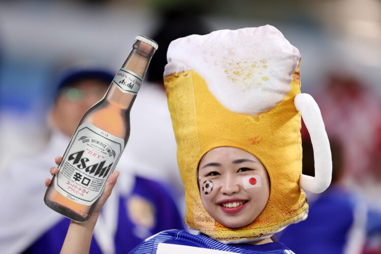 AL WAKRAH, QATAR - DECEMBER 05: A Japan fan wearing fancy dress poses for a photo prior to the FIFA World Cup Qatar 2022 Round of 16 match between ...