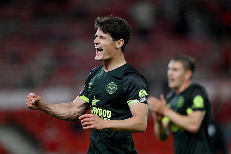 NOTTINGHAM, ENGLAND: Christian Norgaard of Brentford celebrates victory after the Premier League match between Nottingham Forest FC and Brentford F...