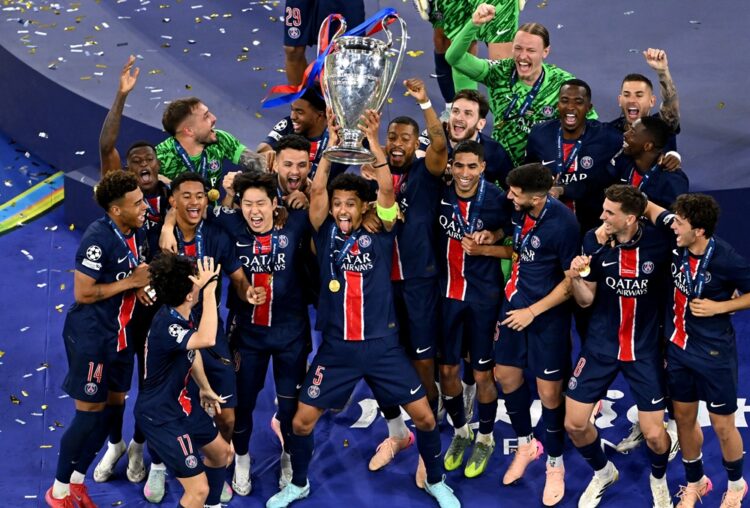 MUNICH, GERMANY: Marquinhos of Paris Saint-Germain lifts the UEFA Champions League trophy following the UEFA Champions League Final 2025 between Pa...