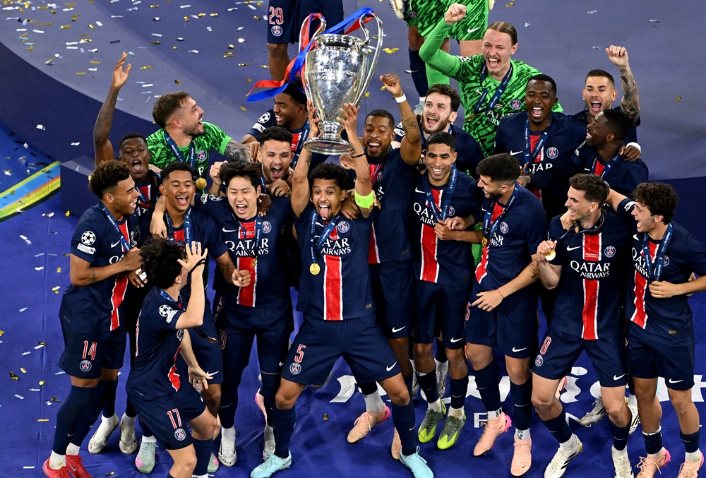 MUNICH, GERMANY: Marquinhos of Paris Saint-Germain lifts the UEFA Champions League trophy following the UEFA Champions League Final 2025 between Pa...