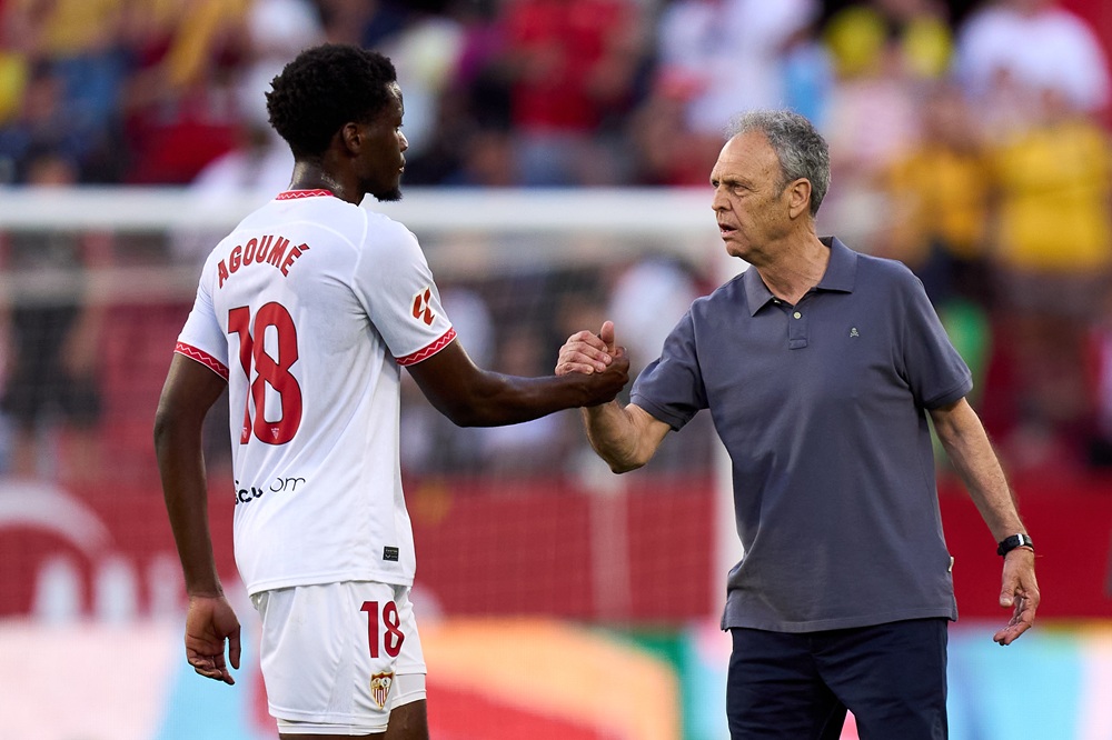 SEVILLE, SPAIN: Joaquin Caparros, Head Coach of Sevilla FC, shakes hands with Lucien Agoume after the LaLiga match between Sevilla FC and Real Madrid CF at Estadio Ramon Sanchez Pizjuan on May 18, 2025. (Photo by Angel Martinez/Getty Images)