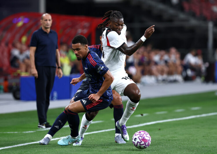 Rafael Leao of AC Milan is challenged by Ethan Nwaneri of Arsenal during the Pre-Season Friendly match between Arsenal FC and AC Milan at National ...