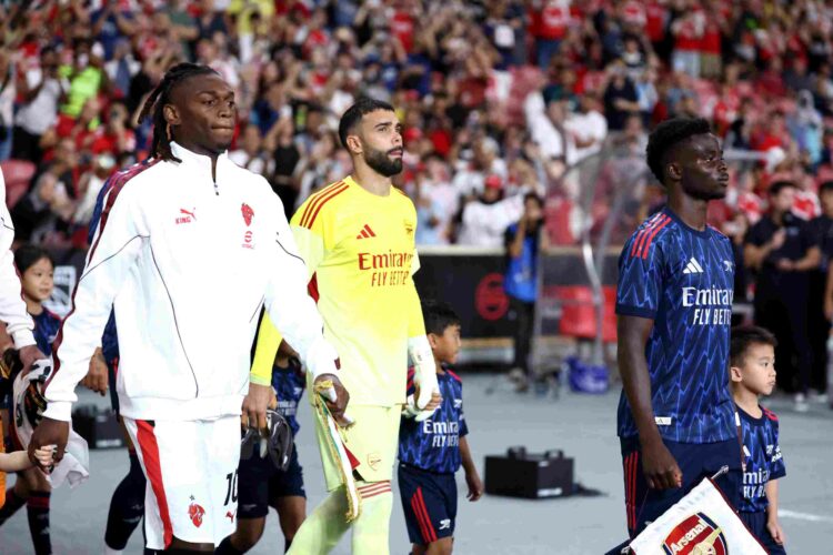 Bukayo Saka of Arsenal leads the team out as captain prior to the Pre-Season Friendly match between Arsenal FC and AC Milan at National Stadium on ...
