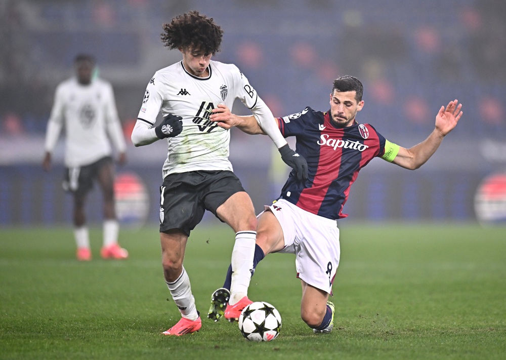 BOLOGNA, ITALY: Maghnes Akliouche of AS Monaco is challenged by Remo Freuler of Bologna during the UEFA Champions League 2024/25 League Phase MD4 m...